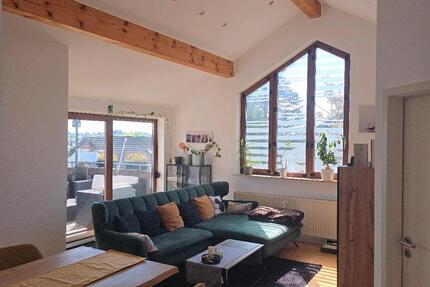 Lichtdurchflutete Dachgeschoßwohnung mit Balkon