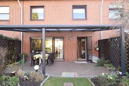 Reihenmittelhaus Ideal für Familie mit 2 Kindern + 2 Garagen + Einbauküche + Garten mit Holzhaus - Haus Syke Steimke | Angebot:25810524