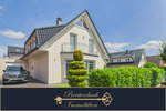 Achim - Uphusen . Modernes Einfamilienhaus mit Wintergarten & großem Garten