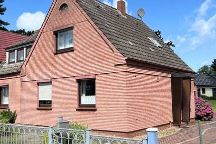 PURNHAGEN-IMMOBILIEN - Freistehendes Einfamilienhaus auf großem Grundstück in ruhiger Nebenstraße von Rekum! 5 zimmer