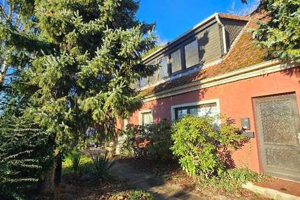 Haus zum Kaufen in Weyhe 258.500 € 175 m² 10 zimmer