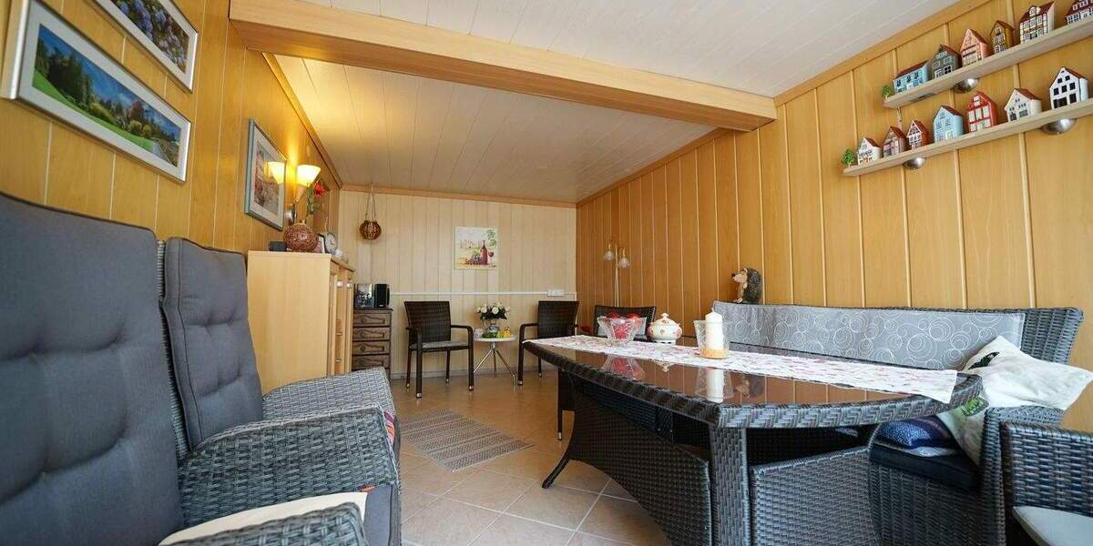 Charmantes Einfamilienhaus auf attraktiven Hanggrundstück mit Carport 7 zimmer