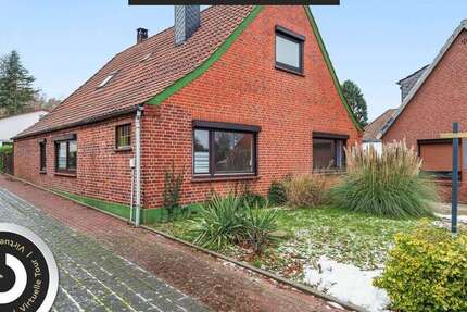 Haus zum Kaufen in Osterholz-Scharmbeck 239.000 € 170 m² 7 zimmer