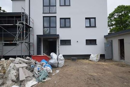Neubau zum 1.7.2026 Hoch moderne Penthouse-Wohnung Rollläden+Stellplatz+Dachterrasse ohne Küche - Haus Weyhe Leeste | Angebot:26621609